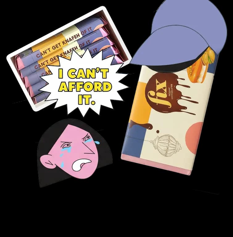 close-up of the viral FIX Dubai chocolate bar being broken open to reveal the knafeh and pistachio filling.